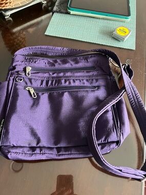 Travelon Purple Crossbody Bag with Multiple Zip Pockets